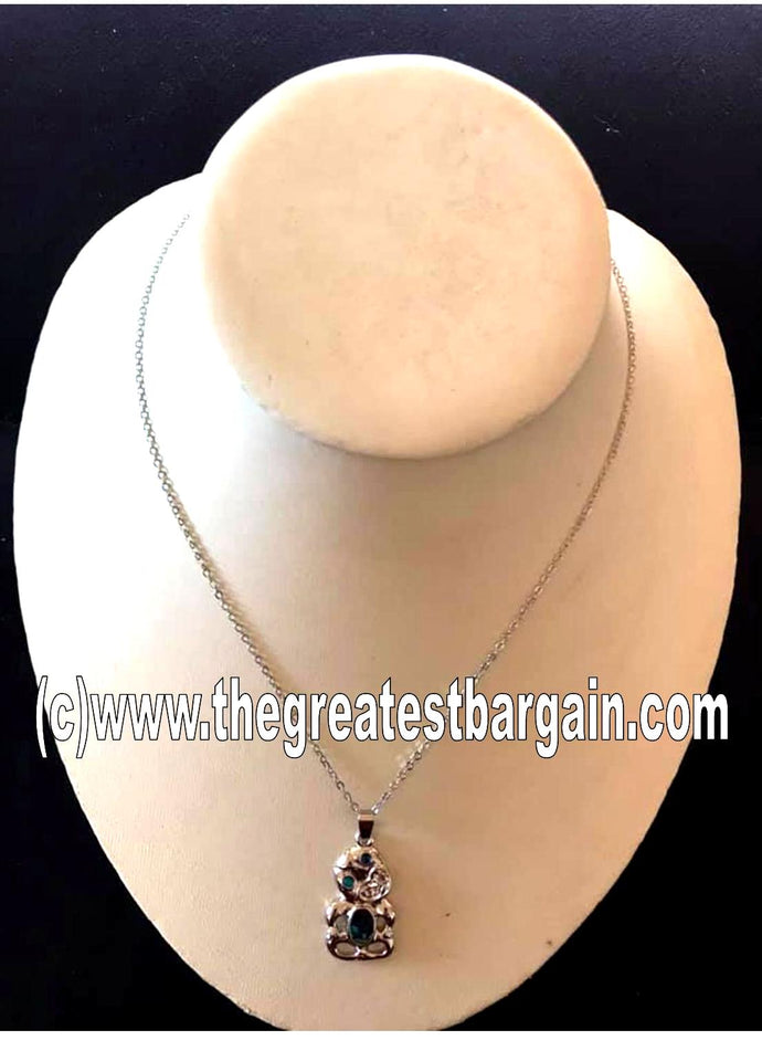 Tiki necklace made from Abalone Paua shell and Zinc Alloy .